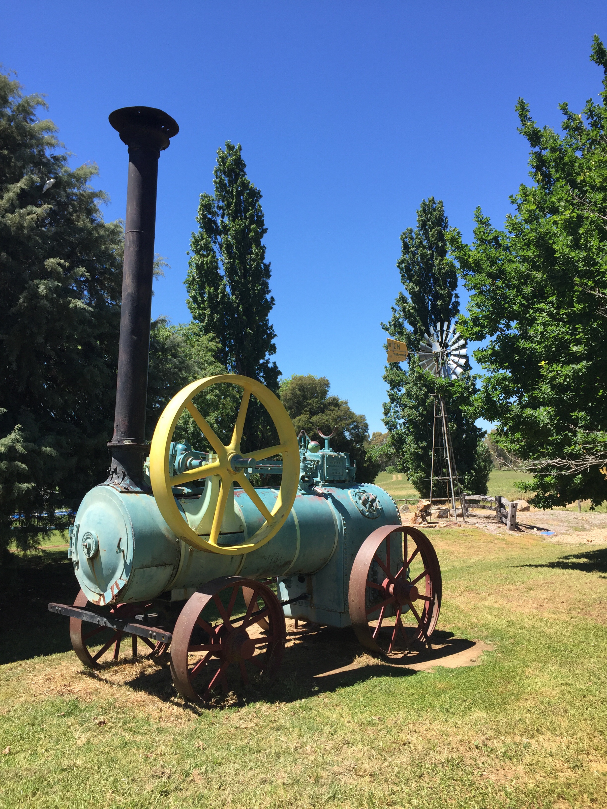OLd machine and windmill in the Jugiong park.