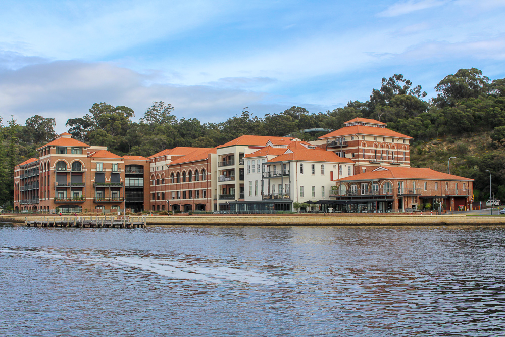 Multi story buildings beside Swan River, Perth