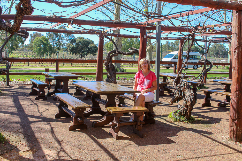 Estelle sitting in a Swan Valley wine garden